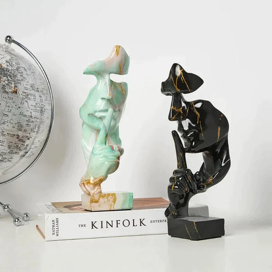 Abstrakta ansiktsskulpturer